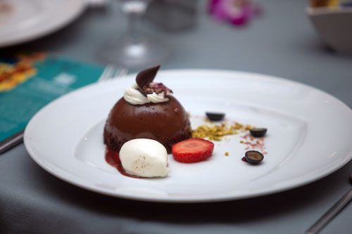 Gourmet chocolate dessert with cream and strawberry at SME Honolulu SPOY banquet event in Waikiki Honolulu Hawaii, featuring fine dining catering, hospitality, and business networking