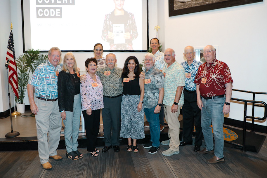 SME Honolulu members gather for a group photo at a networking event featuring The Covert Code presentation.
